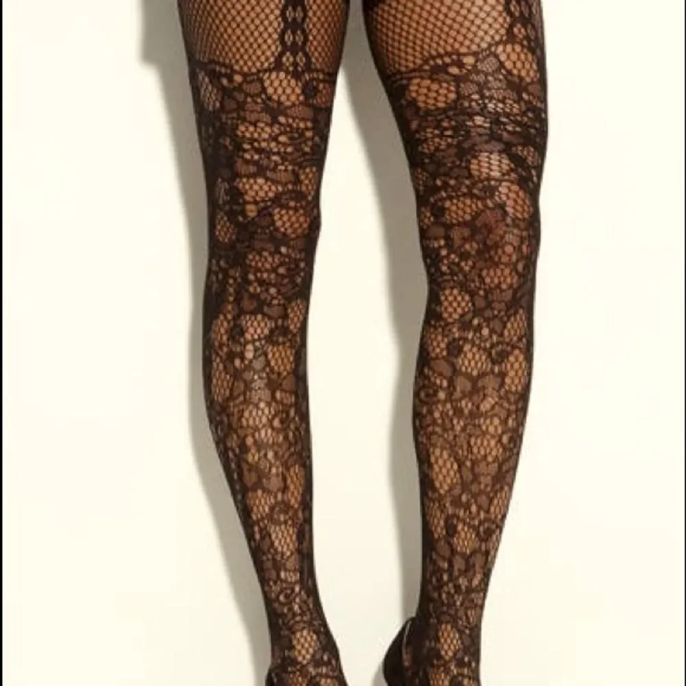 Betsey Johnson Faux Garter Fish Nets.